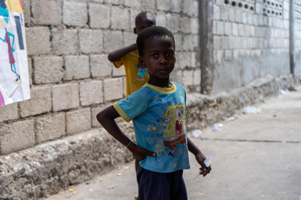 boy walking in Haiti