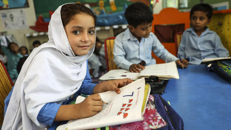 Children around a table at school