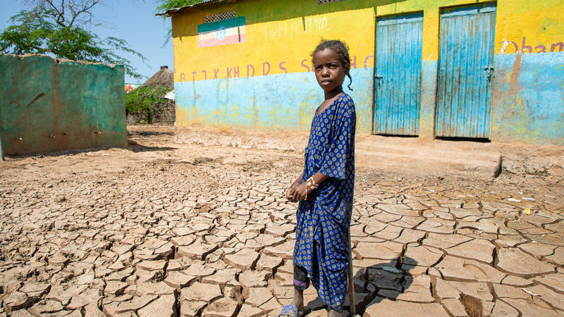 Girl in front of school after flooding in Ethiopia