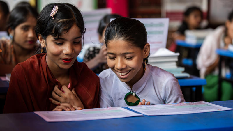 girls at desk in classroom