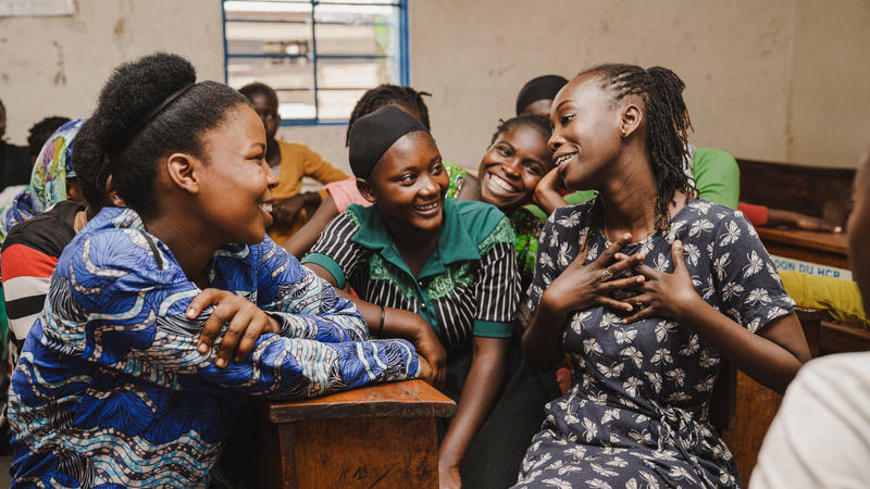 girls in classroom laughing